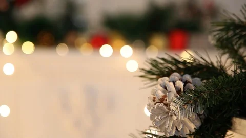 Refocusing with Christmas decorations on a pine cone on a Christmas tree Stock Footage 120945458