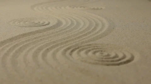 Refocusing the focus from the front circle to the far circle. Zen garden wit Stock Footage 114290897