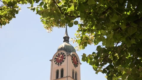 Reformierte Kirche Seengen Clock Tower Framed by Summer Tree Leaves Stock Footage 338352166