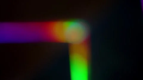 Refraction of light in a prism. Bright gradient rays of rainbow colors on a Stock Footage 281304592
