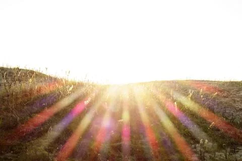 Refraction of the sun's rays in different colors Foto stock
