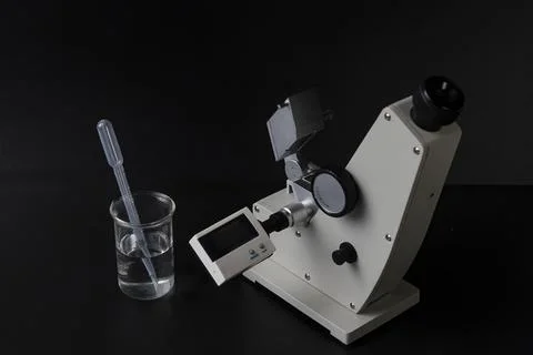 Refractometer" is a laboratory or field device for the measurement of an inde Stock Photos
