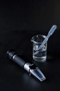 Refractometer" is a laboratory or field device for the measurement of an inde Stock Photos
