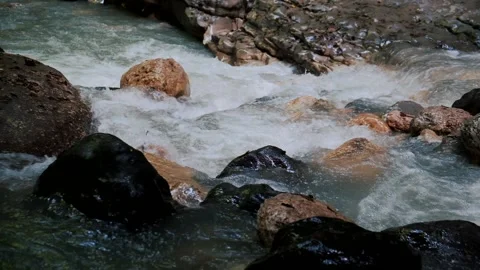 Refresh cold water stream natural waterfall falling from rock Stock Footage 145842141