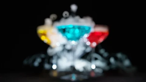 Refreshing alcoholic drinks with smoke  vapour pouring down the glass. Festive c Stock Footage 117787208