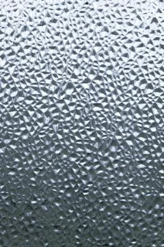 Refreshing background: imitation of dew on a transparent surface, color tonin Stock Photos