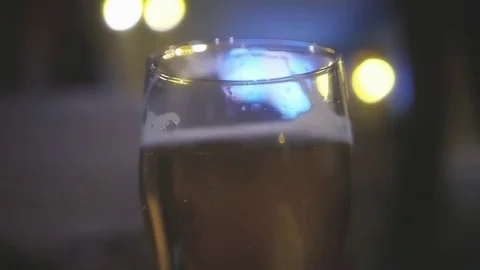 Refreshing beer with foam is in the bar on the table. slowmotion, HD, 1920x1080 Stock Footage 81714857