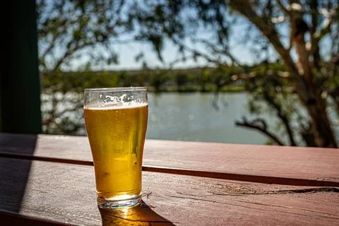 Refreshing Beer by the River Stock Photos