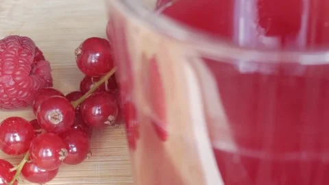 Refreshing Berry Milkshake Displayed with Fresh Ingredients and Vibrant Mood Stock Footage 334582654