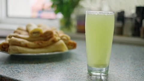 Refreshing Beverage Accompanied by Delectable and Appetizing Pastries for Stock Footage 305326110