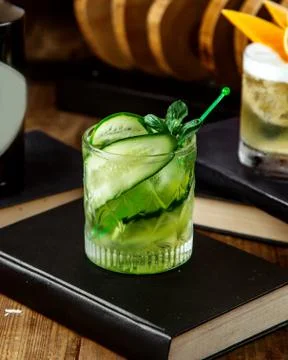 Refreshing beverage with cucumber slices Stock Photos