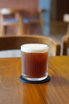 A refreshing blend of bold black coffee and sweet peach flavor Stock-Fotos