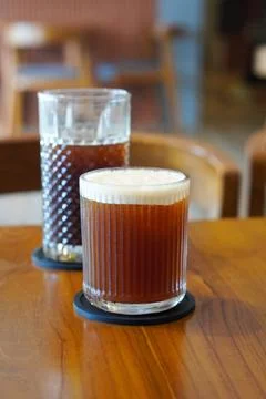 A refreshing blend of bold black coffee and sweet peach flavor Stock Photos