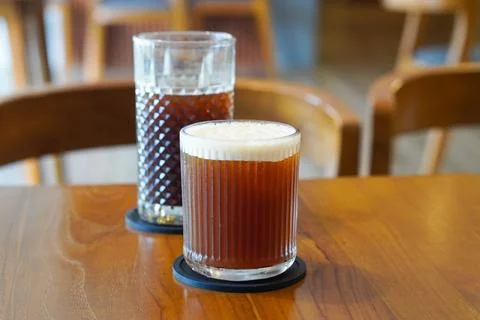 A refreshing blend of bold black coffee and sweet peach flavor Stock Photos