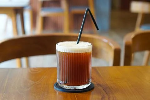 A refreshing blend of bold black coffee and sweet peach flavor Stock Photos