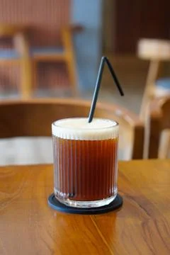 A refreshing blend of bold black coffee and sweet peach flavor Stock-Fotos