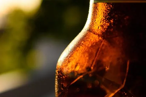Refreshing Brown Cold Beer Bottle Covered With Condensation Stock Photos