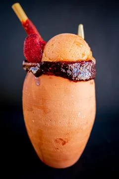 Refreshing cantarito with tequila and mango snow. Stock-Fotos