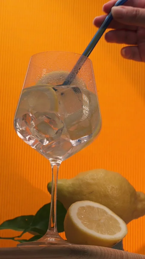 Refreshing Citrus Drink with Straw Video stock 337771978