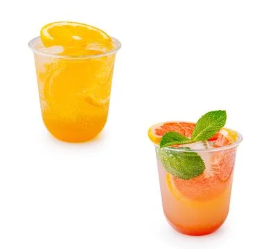 Refreshing citrus drinks with orange and grapefruit slices Stock Photos