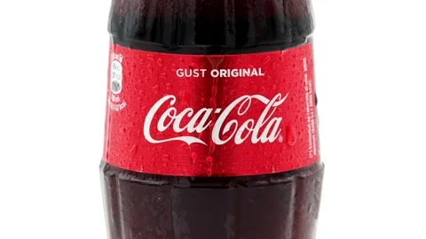 Refreshing coca cola glass bottle and water drops close up Stock Footage 144133170