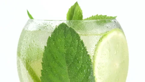 Refreshing cocktail in an elegant glass rotating Stock-Footage 135558786
