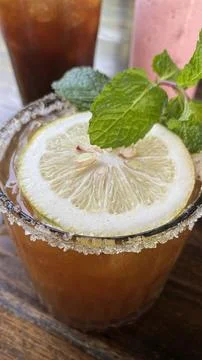 Refreshing Cocktail with Lemon Mint Garnish Closeup Stock Photos