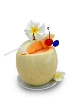 The refreshing cocktail in melon Stock Photos