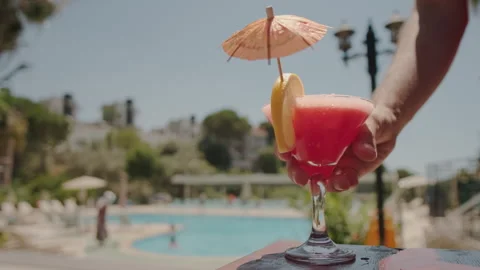 Refreshing Cocktail by the Poolside Stock Footage 282932783