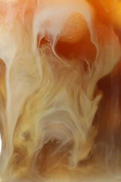 Refreshing coffee with ice and milk as background, closeup 写真素材