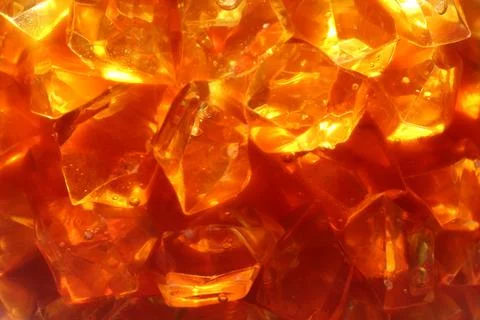 Refreshing coffee with ice cubes as background, closeup Stock Photos