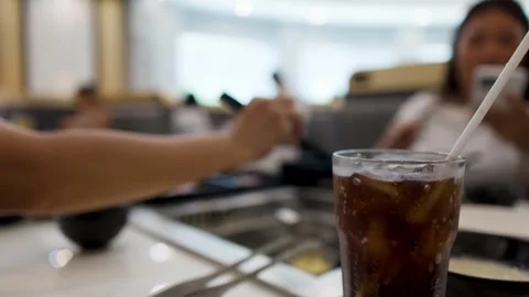 Refreshing Cola Drink on Table at Busy Asian Barbecue Buffet Restaurant Video stock 334282831