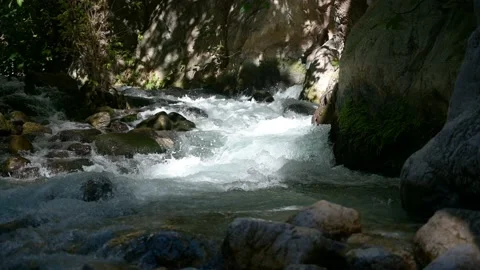 Refreshing cold water of mountain water stream at Saklikent Видео 143552784