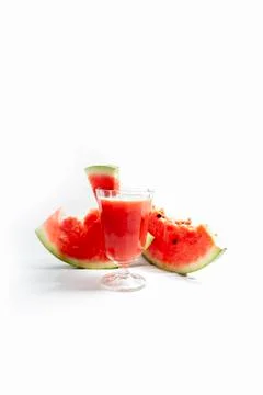 Refreshing cold watermelon juice on a white background Stock Photos