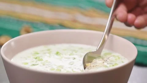 Refreshing cold yogurt soup and cucumber. Stock Footage 154940464