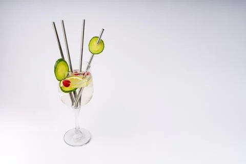 Refreshing Cucumber and Lemon Gin and Tonic Cocktail with Cranberries and S.. Stock Photos
