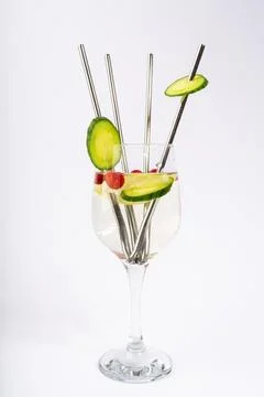 Refreshing Detox Water with Slices of Cucumber, Red Berries, and Eco-Friend.. Stock Photos