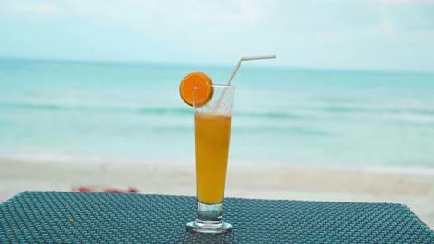 Refreshing drink on the background of the ocean Stock Footage 171447648