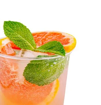 Refreshing drink with citrus and mint on a clear background Stock Photos