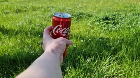 Refreshing drink Coca-Cola Original Taste outdoors Video stock 337817173