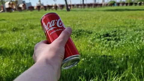 Refreshing drink Coca-Cola Original Taste outdoors Video stock 337817179