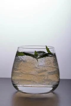 Refreshing drink with gas bubbles. Nalit in a transparent glass. It laid crus 写真素材