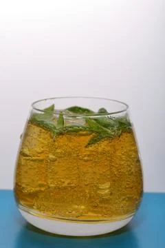 Refreshing drink with gas bubbles. Nalit in a transparent glass. It laid crus 写真素材