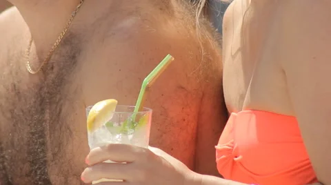 A refreshing drink in hand Stock Footage 64265494