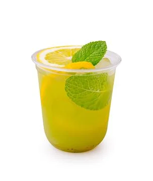 Refreshing drink with lemon and mint served in a clear cup 스톡 사진