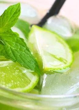 Refreshing drink with mint, lime and ice Stock Photos