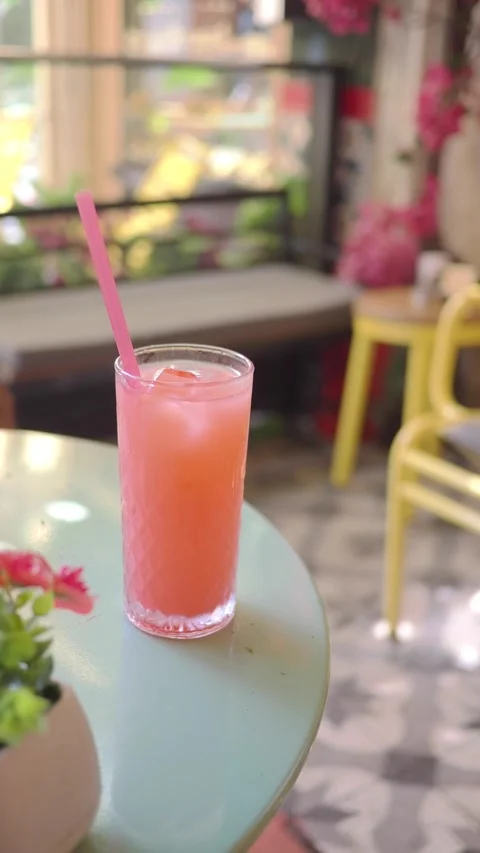 Refreshing drink served in a cafe setting Stock Footage 342304197