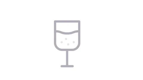 A refreshing drink with a straw and a lemon slice garnishing the rim. Stock Footage 334913636