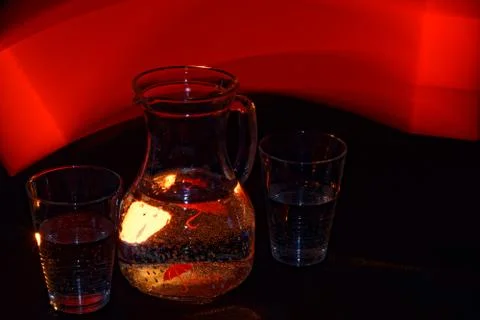 A refreshing drink in an unusual, abstract light 스톡 사진