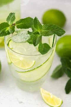Refreshing drinks with lime and cucumber Stock Photos